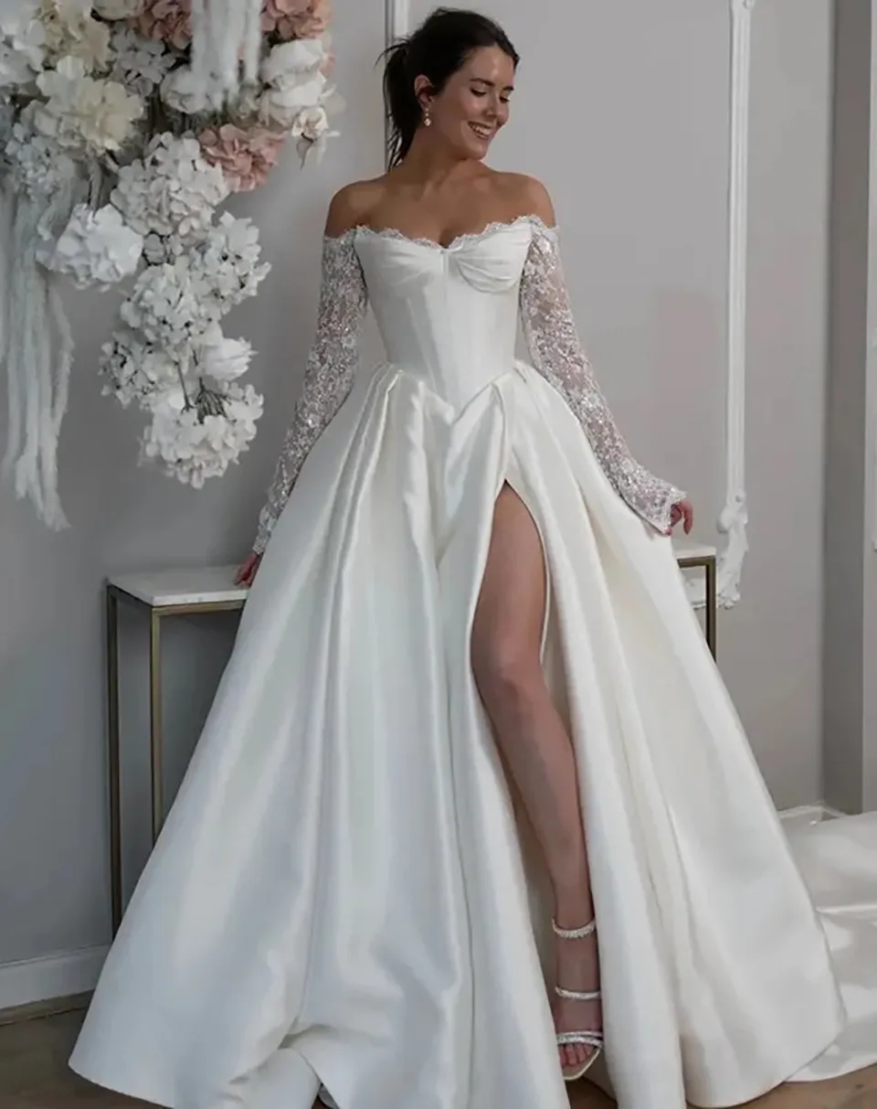 long sleeve wedding dress with slit Lace Sleeves Open Back - Fitted Wedding Dress High making this dress perfect for the bride who wants to make a memorable entrance Long Sleeves Lace Wedding Dresses,