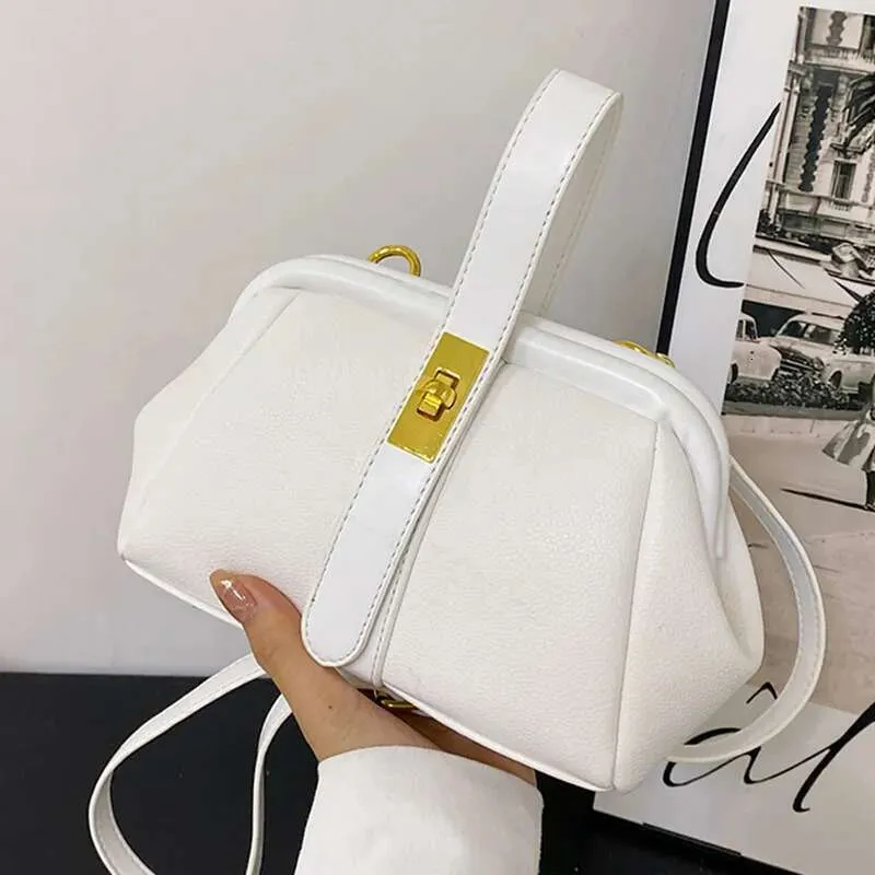 Designer-Damenhandtasche aus orangefarbenem PU-Leder, kleine Clutch mit Muschelclip, gold-blaue Umhängetasche_voghion.com