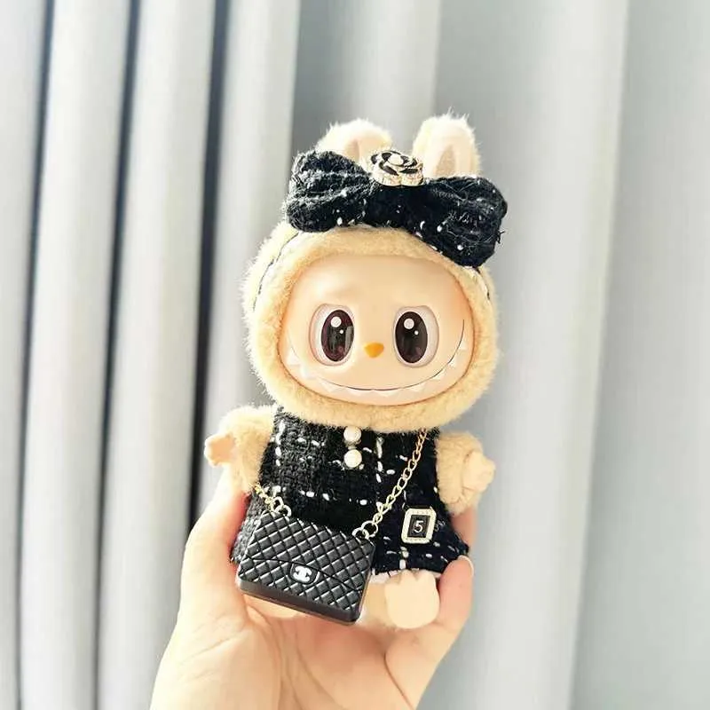 labubu dressed in designer New designer Labubu fits have landed at Learning Express Toys! We also have  a variety of other clothes to make sure you have the best dressed Labubu in  town! Stop by and