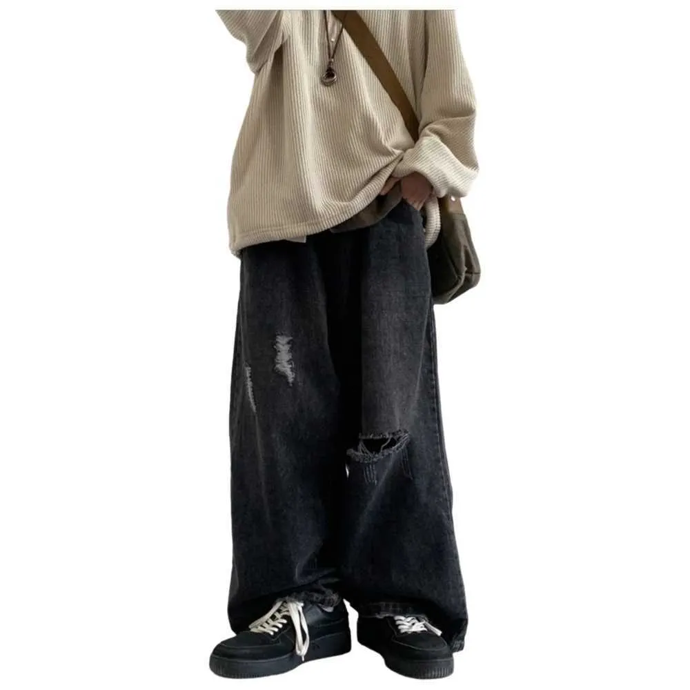 Jeans Strappati In Tasca In Tasca Pantaloni Oversize Uomini E