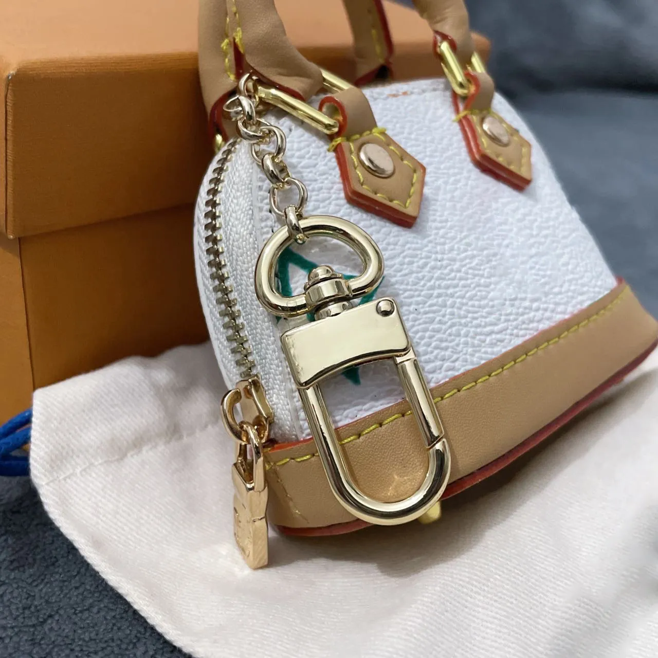 ✓ DHgate 추천 Ey 체인 링 홀더 기하학 인쇄 동전 지갑 열쇠 고리 남성 여성을위한 자동차 가방 펜던트 액세서리 내구성 휴대용  지갑 선물 Z251113 바로 구매