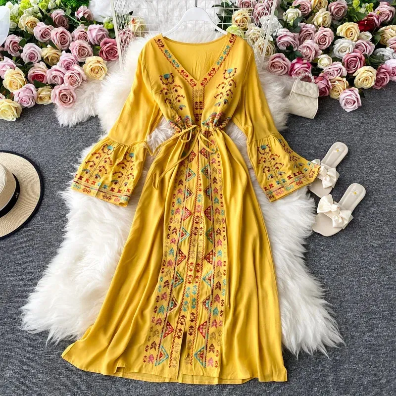 Bohemian Embroidered Vacation Dress with Long Sleeves, V-Neck, Side Slit, and Waist-Fitted Loose-Fit Design - Perfect for Beach meesho party wear Bohemian Embroidered Vacation Dress with Long Sleeves, V-Neck, Side Slit, and Waist-Fitted Loose-Fit Design - Perfect for Beach meesho party wear
