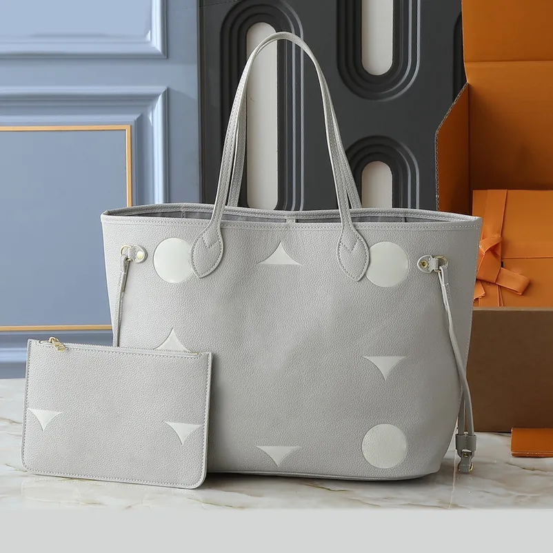 designer tote bag for travel Flower Embroidered Women a tonal interpretation of Torys favorite word Designer Monogram Tote White Designer