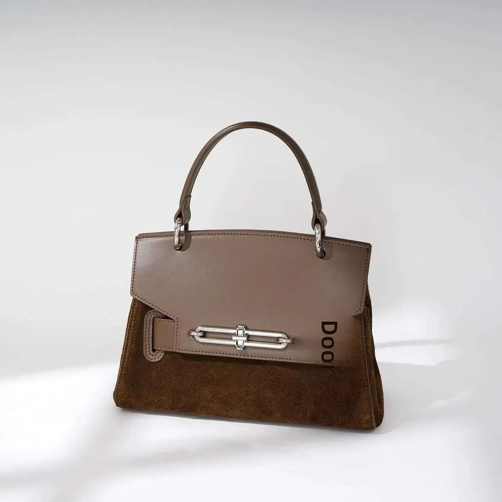 Modieuze, eenvoudige dames schoudertas, niche dameshandtas van echt leer, nieuw model crossbodytas voor motoruitrusting_voghion.com