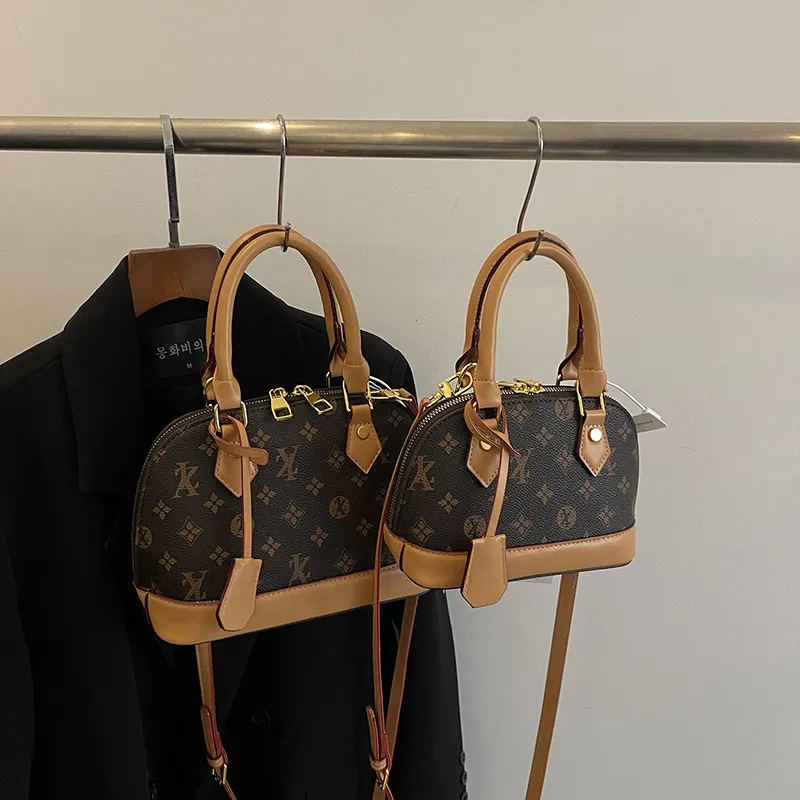 Borsa a tracolla da donna alla moda per la primavera, nuova collezione 2025, elegante e raffinata._voghion.com