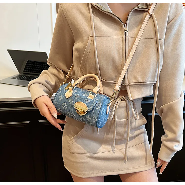 Borsa a secchiello designer in denim intrecciato a spalla retro_voghion.com