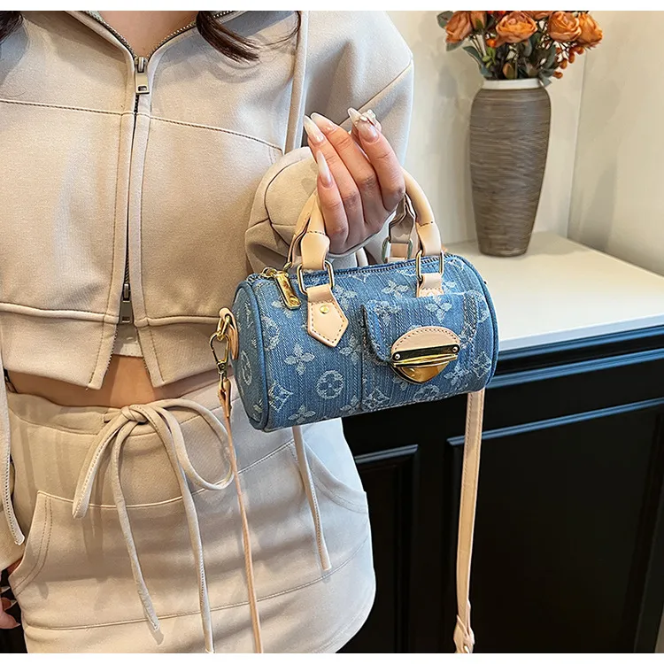 Borsa a secchiello designer in denim intrecciato a spalla retro_voghion.com