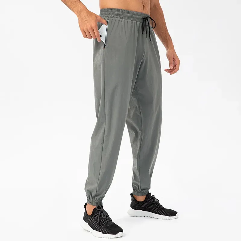 Terranova TUTA RELAXED CON COULISSE - Pantaloni sportivi - canna di fucile/grigio scuro