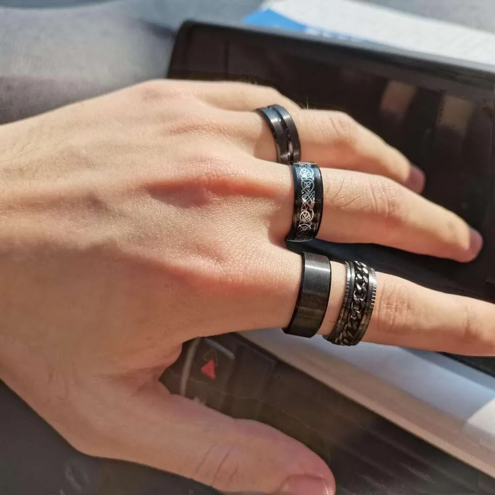 16-teiliges Set aus Edelstahl-Fidget-Spinnern für Damen und Herren zur Linderung von Angstzuständen, mit coolen Ketten, abgeschrägten Kanten und keltischem, schwarzem Band – ideal für Hochzeiten_voghion.com