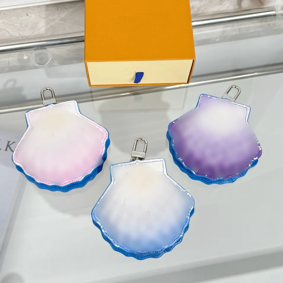 ✓ DHgate 미니 진주 조개 열쇠 지갑 여성 및 남성용 열쇠고리를 갖춘 럭셔리 마이크로 동전 주머니 | 다양한 키체인