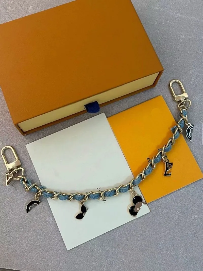 Designer metal bag charm keychain with flower heart snap fastener in ...