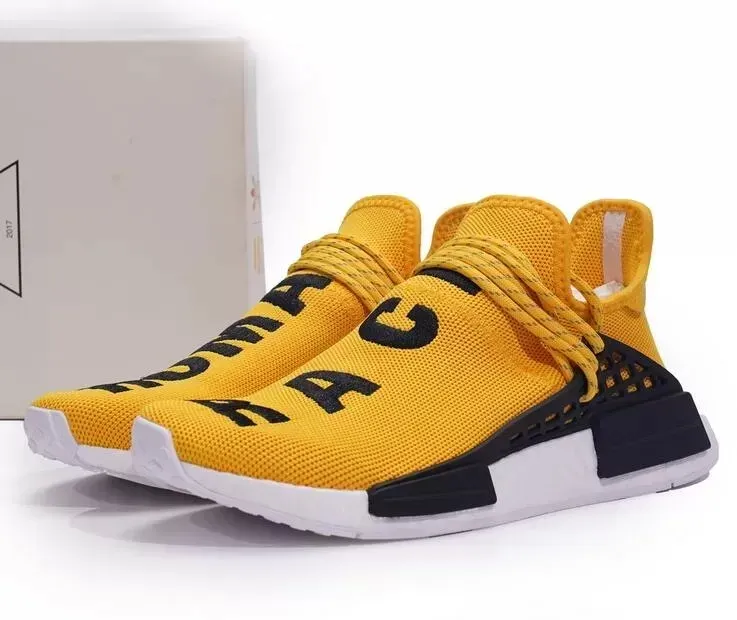 gold human race shoes