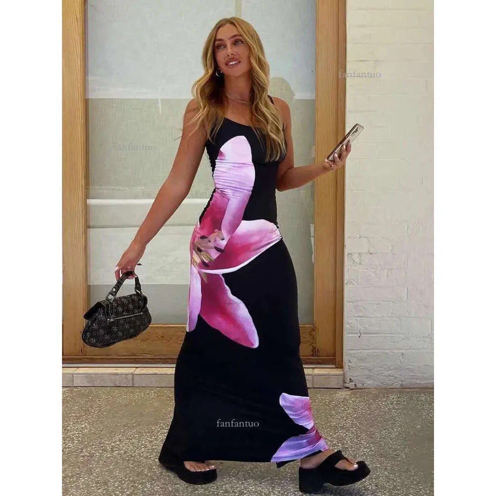 Summer Casual Printed double maxi dress with Tossy Spaghetti Straps, Lily Floral Design, Backless Bodycon, Slim Fit, and Boho Flair - Style 230524 Summer Casual Printed double maxi dress with Tossy Spaghetti Straps, Lily Floral Design, Backless Bodycon, Slim Fit, and Boho Flair - Style 230524