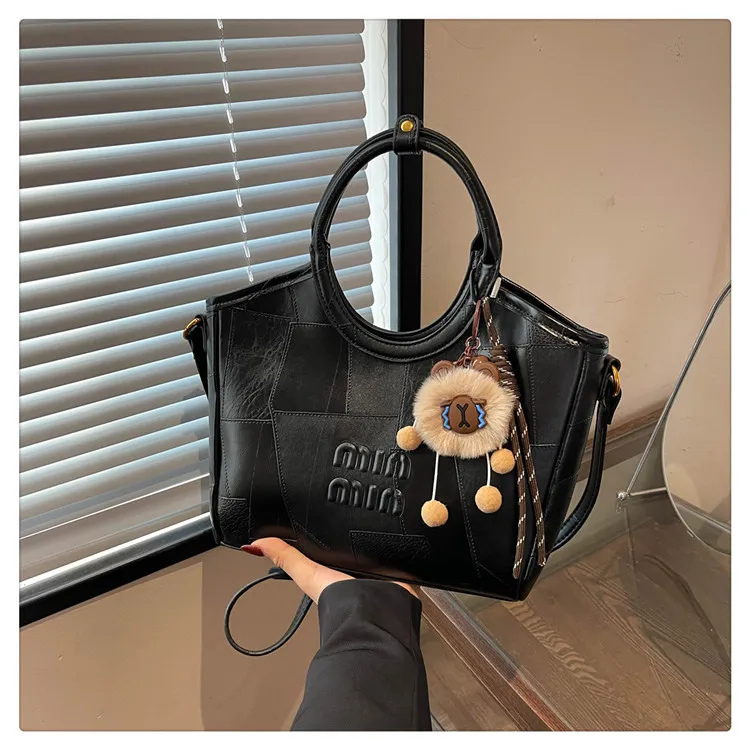 designer bag 2025 new Fashionable high-grade textured soft leather bag for women Versatile handbag Commuter crossbody basket bucket bag