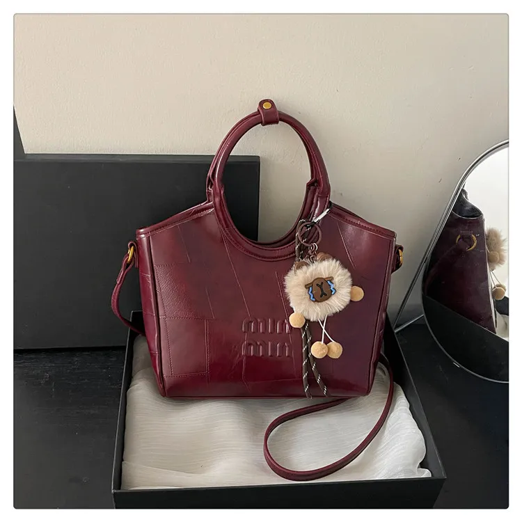 designer bag 2025 new Fashionable high-grade textured soft leather bag for women Versatile handbag Commuter crossbody basket bucket bag