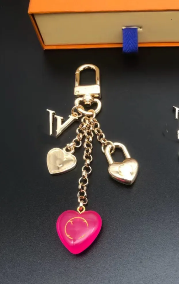 Fastener Keychain Luxury metal keychain with snap fastener and aventurine stone, gold and ...