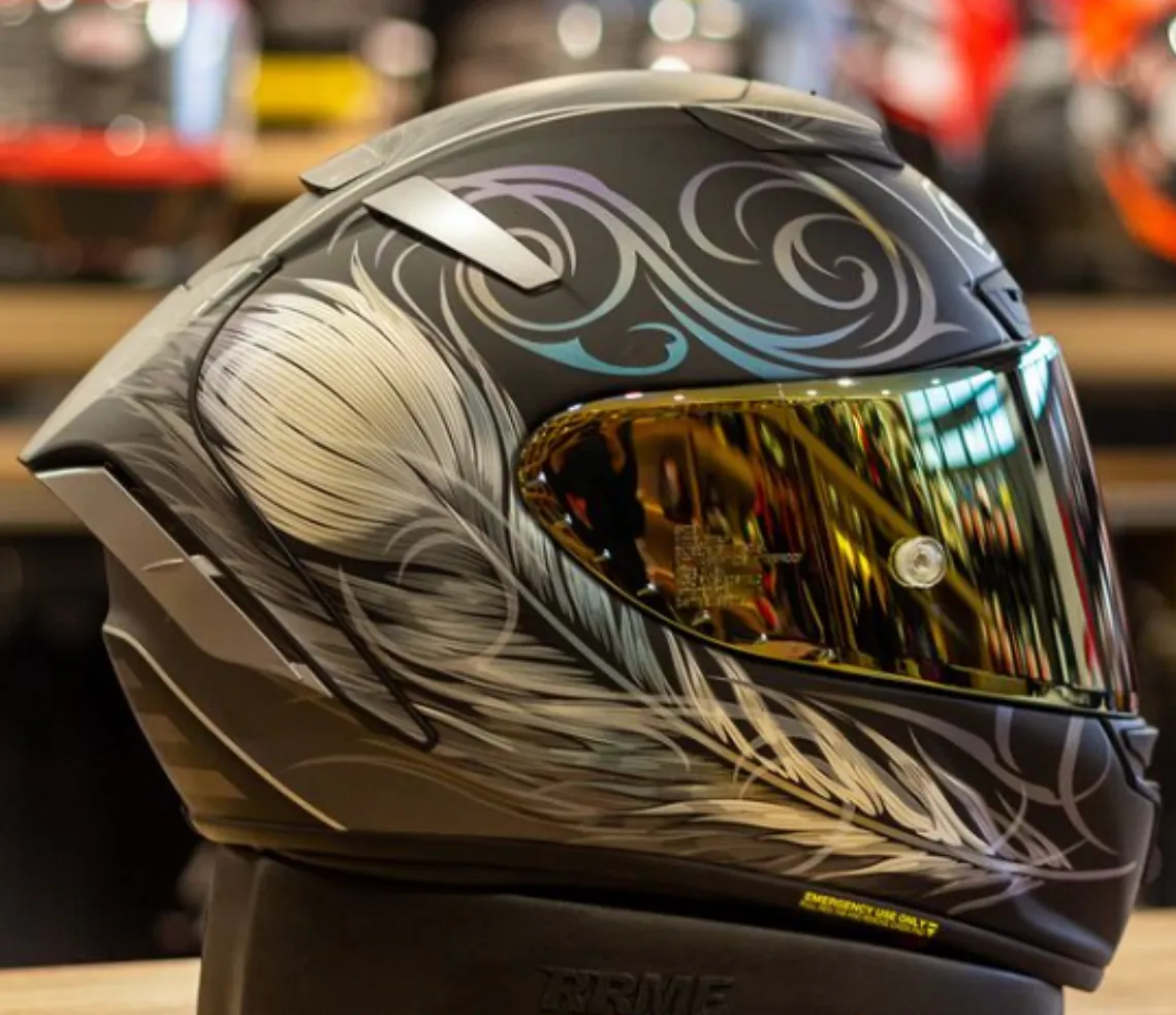 shoei black helmet with gold visor GT-Air II Glorify Equipped with many of SHOEIs top features while keeping functionality efficient and to the point SHOEI RF-1400 SHOEI Helmets