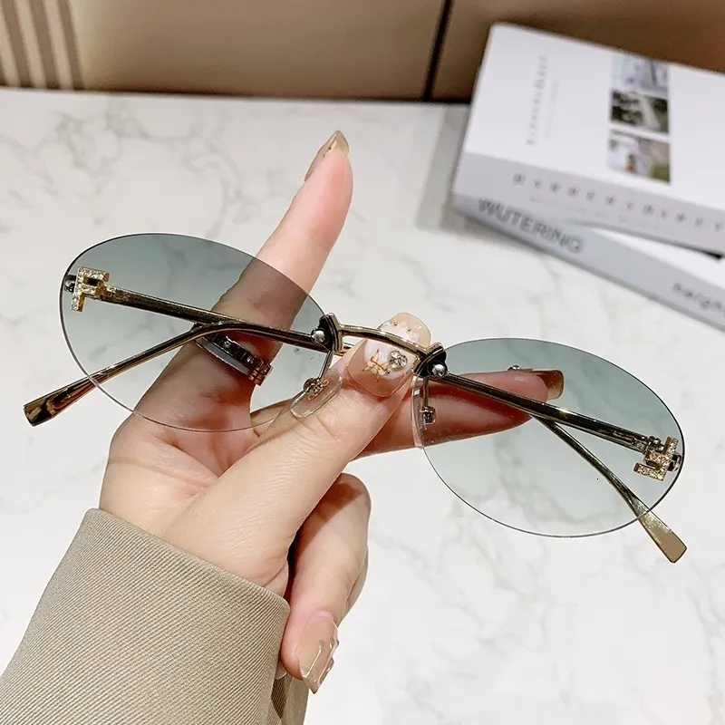 Sunglasses Letter F Rimless Edge Fashion Metal Oval Small  display picture 1