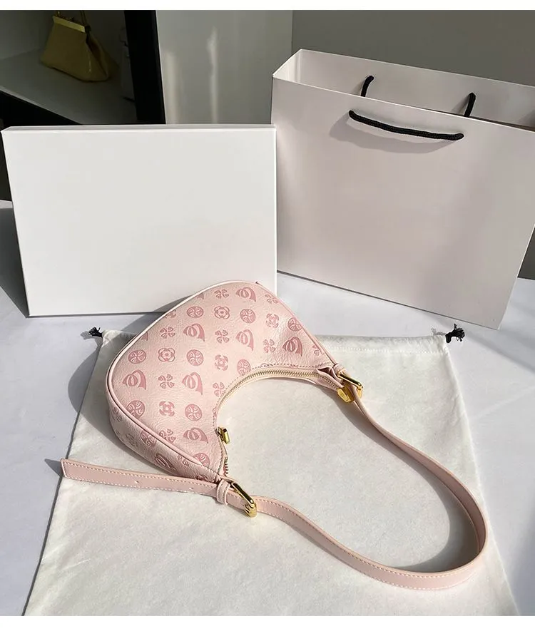 Spedizione gratuita 2025 Nuove borse a tracolla firmate per donna Borsa a forma di mezzaluna rosa sottobraccio Borsa a tracolla singola a mano_voghion.com