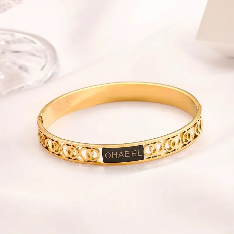 Elegant Black And Gold Tone Bangle Bracelets For Women  display picture 1