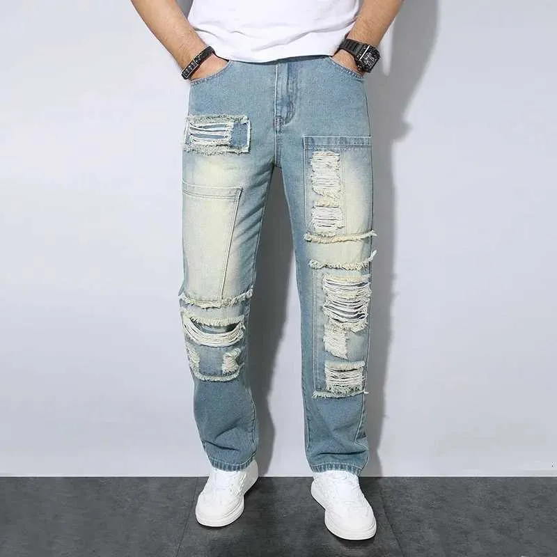 Jeans Larghi Strappati Da Uomo Slim Fit Azzurri Design Con Foro