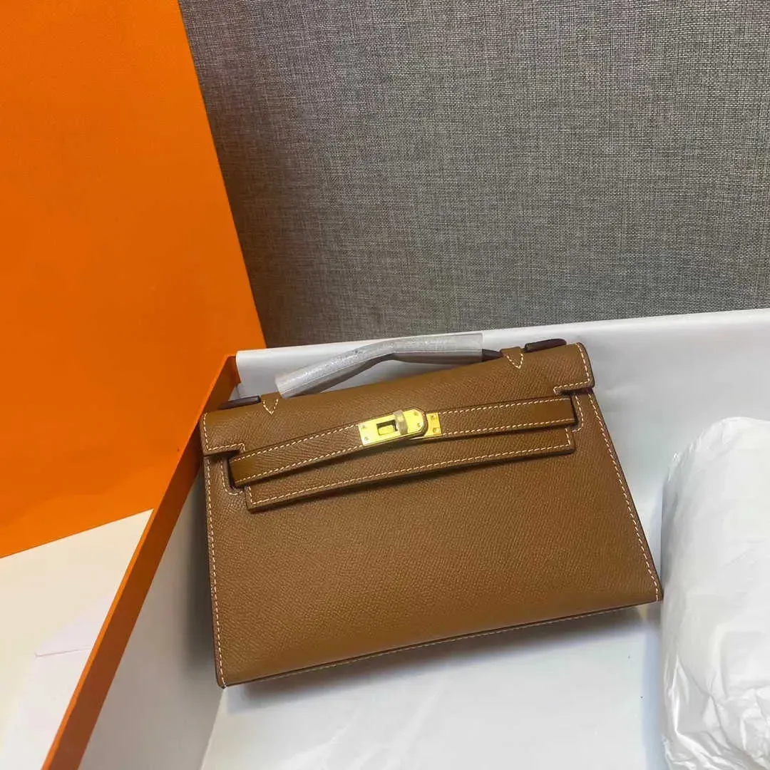 A Hkelys Luxury Bag Can carry the label of first generation Mini One Shoulder Oblique Straddle Portable Dinner Fashion Genuine Leather Small Square Women's