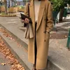 Trench da donna femminile 2024 Autunno Inverno coreano giacca di lana allentata donna per il tempo libero moda versione di media lunghezza soprabito senso avanzato