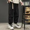 Herenbroeken Lente Herfst Japanse stijl Corduroy Werkbroek Mode Veelzijdige losse rechte buis Trekkoord Casual effen broek