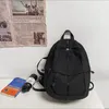 Sacs d'école imperméable à l'eau en nylon femmes sac à dos femme sac de voyage sac à dos cartable couleur unie bookbag Mochila sac à dos de haute qualité