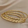 Bangle Aensoa 3st Gold Color Twist Thin Cuff Armband för kvinnor rostfritt stål Klassiskt chic staplade tibetanska Buddha -smycken