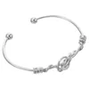 Charme pulseiras banda de pulso geométrica torção atada elegante coração forma pulseira pulseira para mulheres metal meninas manguito jóias
