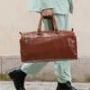 ダッフェルバッグレトロレザー大容量牛hideキャリーオン荷物男性と女性ビジネス旅行通勤バッグ
