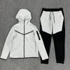 Tech Fleece Tracksuit Women Men Długie rękawie Zestaw Spit Strzelcy Polo Tracksuit Zestaw Setki potu do sportu sportowego Joggers Czerwony kaptur