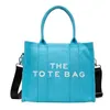 Дизайнерская женская сумка Canvas Women's 2023 Spring Leisure Letter Handheld на одно плечо через плечо The Tote Bag