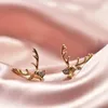 Boucles D'oreilles La Tête De Pied Classique Sont De Niche Et Luxueuses