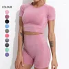 Conjuntos activos Conjunto de entrenamiento sin costuras para mujer Oulylan, trajes de yoga de cintura alta de 2 piezas, top corto de manga corta con pantalones cortos para correr, ropa deportiva para gimnasio