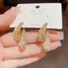 Pendientes de tuerca de estilo coreano, temperamento exquisito, circonita de moda, agujas de plata 925, pendientes ligeros de lujo en la parte delantera y trasera.