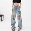 Jeans pour femmes été Graffiti bleu trou de lavage pantalon à jambes larges plancher Slam tube droit 2024 tendance de la mode