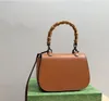 Desgaste de couro Bolsas de ombro Estilo de moda Projetado pelos principais designers bolsas Cross Body Purse Totes Formato da câmera Alça de ombro removível Padrão exclusivo