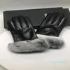 Män fårskinn handskar designer cape svart handske vinter varma plysch gants klassiker guanto triangel modemärke