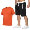 Herrspårar Bomull- sommaren 2024 Two Piece Set Men Short Sleeve T Shirt Croped Top Shorts QR Design Fashion Qxx