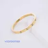 Pulsera de edición de alta calidad Llantas de automóvil de lujo ligeras Acero de titanio Tarjeta de diez diamantes Hogar Oro rosa de 18 quilates Moda Estrella del cielo completa Conjunto de acero inoxidable con caja original