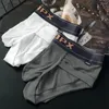 Calzoncillos para hombre, calzoncillos modales amigables con la piel, bolsa grande para el escroto, bragas transpirables para el sudor, ropa interior deportiva de Color sólido, lencería antideslizante