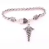 Charm Bracelets CADUCEUS Bracelet Is Embellished With Crystal Rhinestones. Symbol-Two Snakes Winding Up Winged Rod