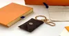 2021 Designer Letter Wallet Keychain Keyring Fashion Purse Pendant Car Chain Charm Brown Flower Mini Bag Trinket Gifts Accessories6326710