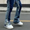 Vintage nödställda stänk av bläck flare jeans herr streetwear lapptäcke hip hop graffiti tung tvätt blå smal fit denim byxor män 240102