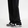 Herrstreetkläderbyxor Knapp dekorera jeans mode trend lösa raka byxor svarta färg casual byxor s-2xl 240102