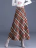 Kjolar koreanska tjock ull veckad lång kjol för kvinnor 2024 höst vinter vintage pläd en linje fickor hög midja midi kvinnlig varm