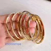 Autoreifen-Armband. Modisches Damenarmband mit Diamanteinlage, modisch und vielseitig, Edelstahl, oval, innen hell, 18 Karat Gold, mit Originalverpackung