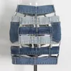 Kjolar sexiga ihåliga lapptäcken denim last kvinnor 2024 sommar modedesign asymmetrisk blå jeans mini kjol bodycon faldas